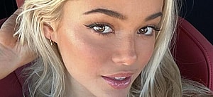 Olivia Dunne takes a selfie in the car.