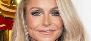Kelly Ripa smiles at an event
