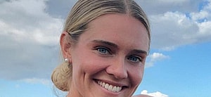 Alysha Newman smiles at the camera.