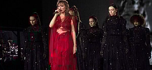 Taylor Swift singing in the rain