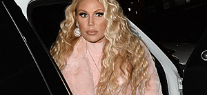 Gretchen Rossi stepping out of a car.