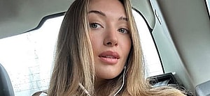 Penny Lane snaps a selfie.