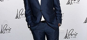 Chase Chrisley posing on the red carpet.