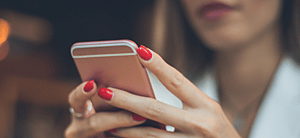 Woman looking at cell phone