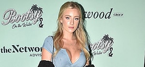 Daisy Keech standing