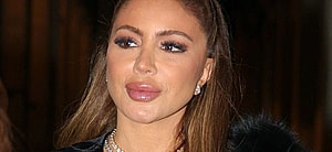 Larsa Pippen turns up the glam in skintight leggings and a cleavage-baring top for a chic night out in Paris