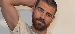 Chasel Barnett posing with hand behind his head