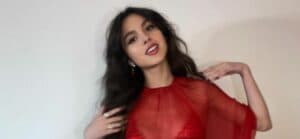 Olivia Rodrigo in a red shimmery dress