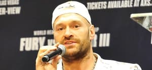 Boxer Deontay Wilder a nd Tyson Fury tensely at a press conference in downtown Los Angeles