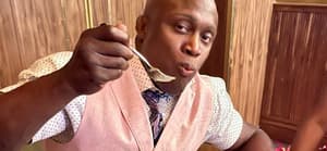 Bobby Lashley eating cake