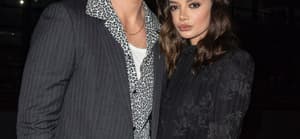 Miles Teller and Keleigh Sperry attend the Celine show as part of the Paris Fashion Week