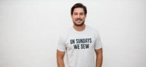 A photo showing Craig Conover slaying a white Tee.