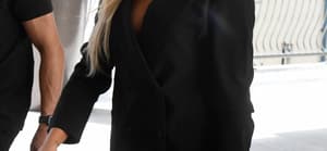 Khloe Kardashian shows off her legs in a tiny minidress while rocking a pink diamond ring from ex-boyfriend Tristan Thompson at a mall in Miami