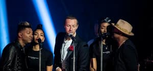 Coldplay performing at the Natural History Museum, London