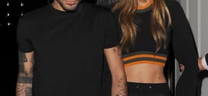 Zayn Malik and Gigi Hadid leaving the Versace Versus show