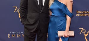 Bob Saget and Kelly Rizzo smiling.