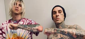 Machine Gun Kelly Changes Album Name, AFTER Travis Barker Tattoos It On His Arm!