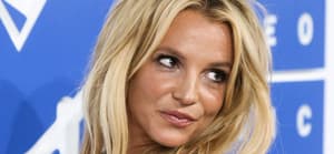 Britney Spears wearing a Julien MacDonald dress, H Stern jewels, and Christian Louboutin shoes arrives at the 2016 MTV Video Music Awards