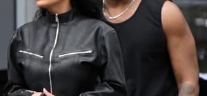 A newly single Kanye West is seen leaving his hotel with new girlfriend Chaney Jones in Miami