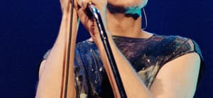 Pop star David Bowie performing on stage during a concert at The Scottish Exhibition and Conference Centre (SECC) in Glasgow.