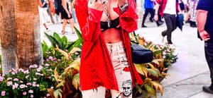 Bella Thorne Looks Sexy In Red While Enjoying Herself At Coachella in Indio CA