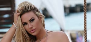 Kindly Myers in a tan bikini featured photo
