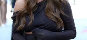 Chrissy Teigen and John Legend help out behind the counter on the apos Cravings By Chrissy Teigen food truck in Beverly hills