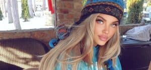 Dana Hamm celebrates Merry Christmas Eve in a tiny black bra and thong