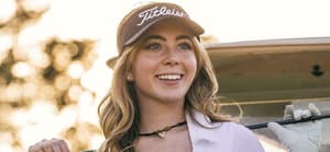 Grace Charis golfing