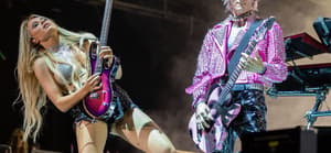 Sophie Lloyd and Machine Gun Kelly at 2022 Lollapalooza in Chicago