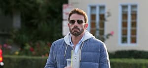Ben Affleck enjoys a early morning ice coffee while out for a walk in Los Angeles
