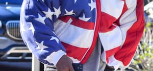 Kanye West heads to church wearing an American flag jacket