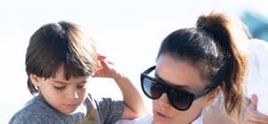 Eva Longoria hits the beach with her husband José Bastón and their 4 year old son Santiago Enrique Bastón while on vacation in Marbella, Spain