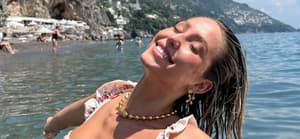 TikTok Star Alix Earle Soaks Up The Sun In Italy In Her Little Bikini
