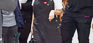Kourtney Kardashian heads out in a Blink-182 t-shirt and overalls