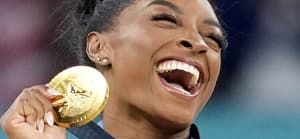 Simone Biles of the United States poses after winning gold in the women's artistic gymnastics individual vault final at the Paris Olympics on Aug. 3, 2024
