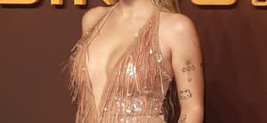 Lottie Moss poses at "The Hunger Games: The Ballad of Songbirds & Snakes" World Premiere.