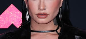 Demi Lovato wearing Christian Louboutin pumps arrives at the 2023 MTV Video Music Awards
