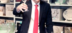 Wells Adams holding champange glass in JCPenney