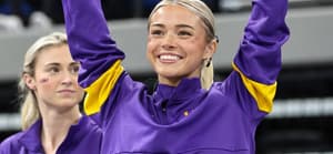 February 28, 2025: LSU's Aleah Finnegan competes on the balance beam during the Purple and Gold Podium Challenge woman's gymnastics LSU vs George Washington at the Raising Canes River Center in Baton Rouge, LA. Jonathan Mailhes/CSM. 28 Feb 2025 Pictured: February 28, 2025: LSU's Olivia Dunne is introduced to the audience prior to the Purple and Gold Podium Challenge woman's gymnastics LSU vs George Washington at the Raising Canes River Center in Baton Rouge, LA. Jonathan Mailhes/CSM. Photo credit: ZUMAPRESS.com / MEGA TheMegaAgency.com sales@mega.global (Mega Agency TagID: MEGA1276490_001.jpg) [Photo via Mega Agency]