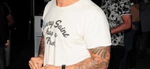 Jax Taylor smiling for a picture at a popular eatery in California.