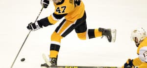 A photo showing former Pittsburgh Penguins center Adam Johnson (47) in the second period of the Predators 3-1 win against the Pittsburgh Penguins at PPG Paints Arena in Pittsburgh on March 29, 2018.