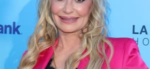 Taylor Armstrong posing for pictures on the red carpet.