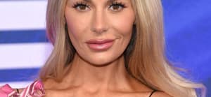 Dorit Kemsley posing on the red carpet.