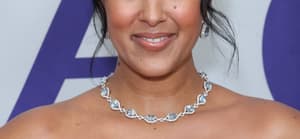Tamera Mowry posing on the red carpet.