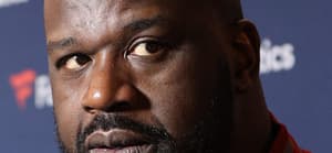 Shaq posing for a picture.