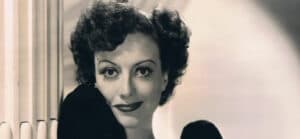 Joan Crawford hugging herself