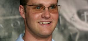 Zachery Ty Bryan posing on the red carpet.
