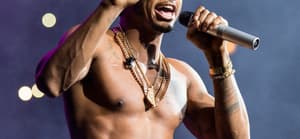 Trey Songz performing on stage.