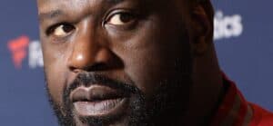 Shaquille O'Neal posing on the red carpet.